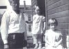 This is the oldest photo we have of Mickey, in Seattle with her grandpa and older sister Merrieta.