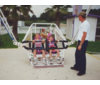 Jess and Matt on ride in Florida-vacation with Dad, stepmom, and family-Summer 2000.